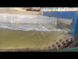 Bố trí kết cấu tiêu năng phụ trong bể tiêu năng đối với tràn xả lũ có dốc nước tiêu năng đáy